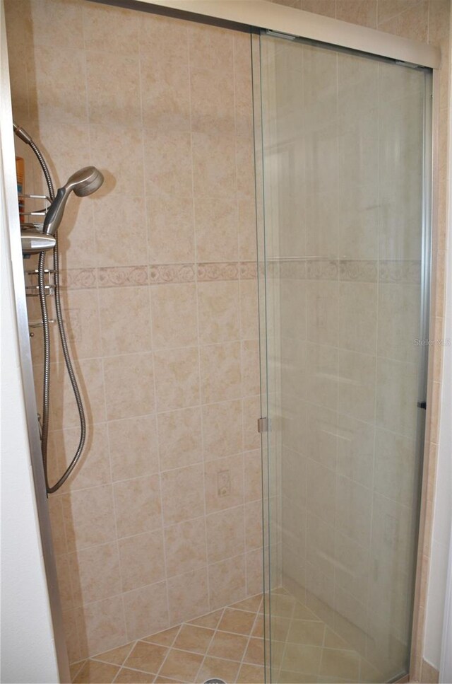 bathroom with an enclosed shower