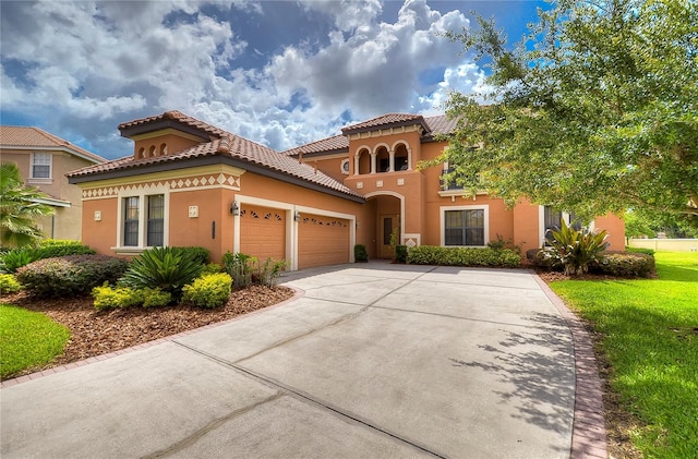 mediterranean / spanish-style house featuring a garage