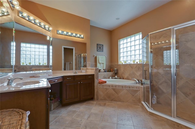 bathroom featuring vanity and plus walk in shower