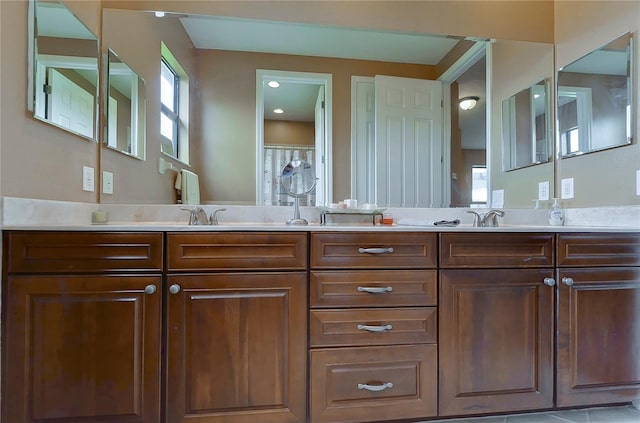 bathroom featuring vanity and tile patterned floors