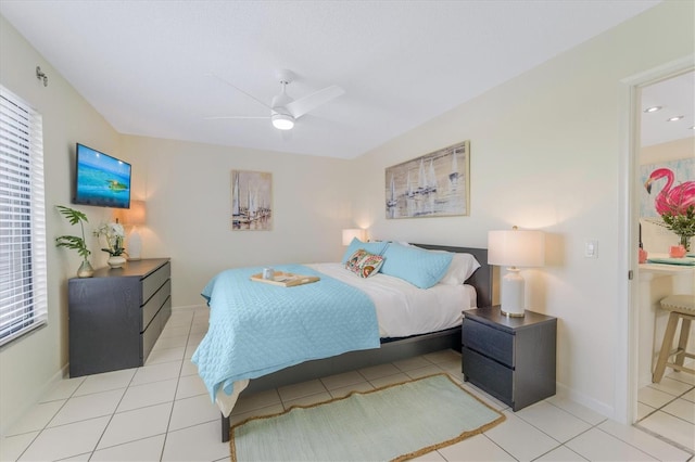 bedroom featuring ceiling fan and light tile patterned flooring