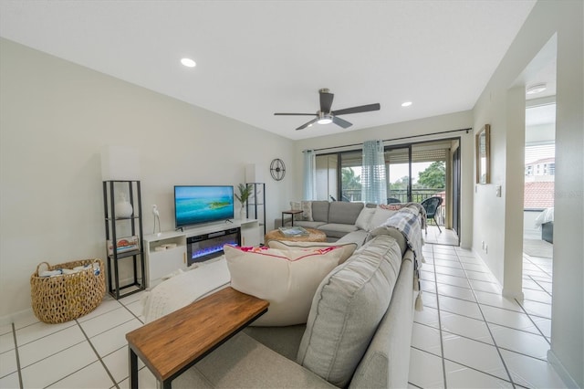 tiled living room featuring ceiling fan