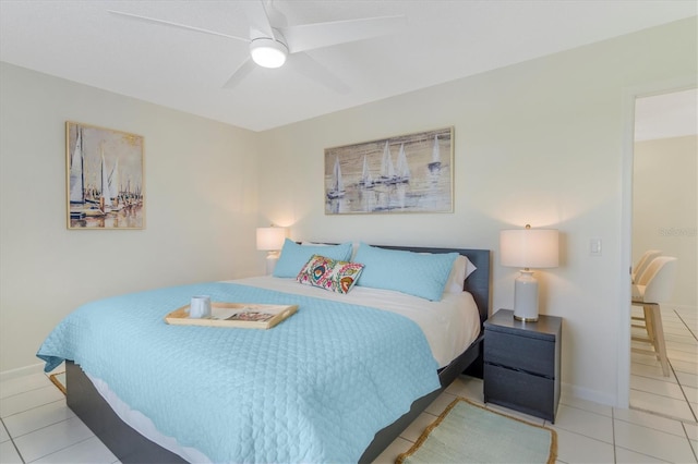 bedroom featuring tile patterned floors and ceiling fan