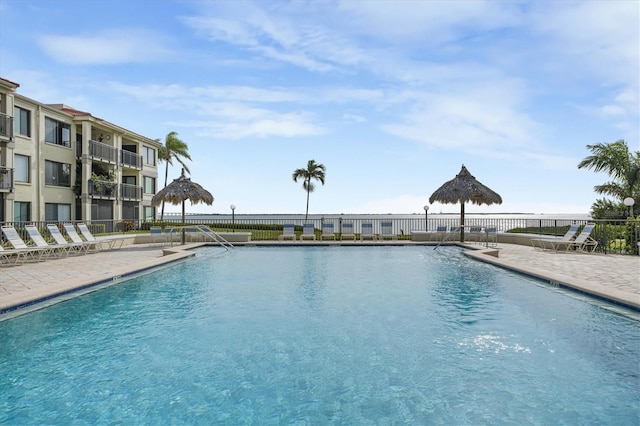 view of swimming pool featuring a patio area