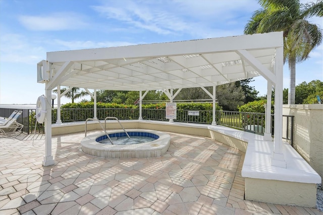 view of patio / terrace featuring a pergola and a community hot tub