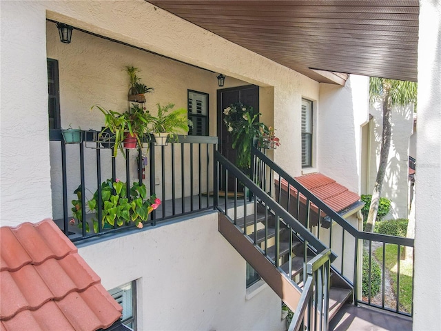 property entrance with a balcony