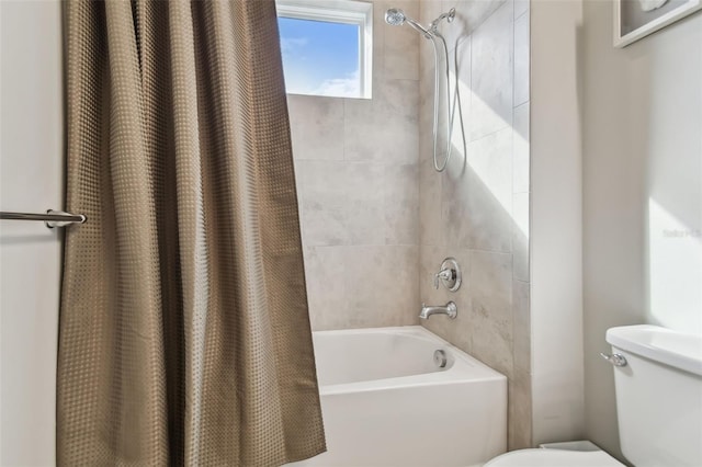 bathroom featuring toilet and shower / bathtub combination with curtain