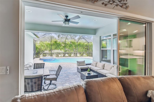 101 Brookover Ln, Brandon, FL 33511 - living room featuring a ceiling fan and a sunroom