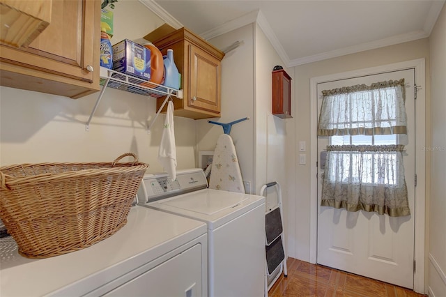 laundry area with cabinets, crown molding, washer and dryer, and parquet floors