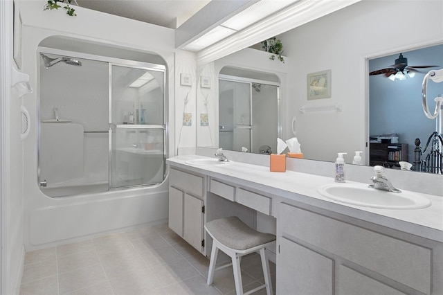 bathroom featuring vanity, enclosed tub / shower combo, tile patterned floors, and ceiling fan