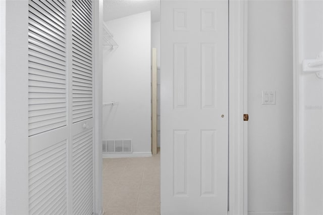 bathroom featuring a textured ceiling