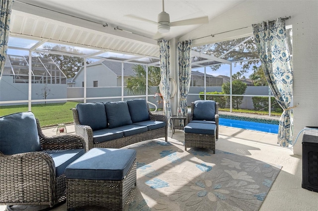 sunroom / solarium featuring ceiling fan, vaulted ceiling, and a pool