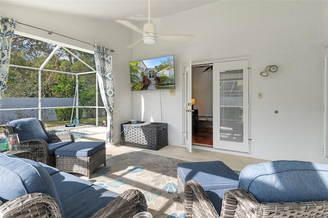 view of patio with ceiling fan, a lanai, and an outdoor hangout area