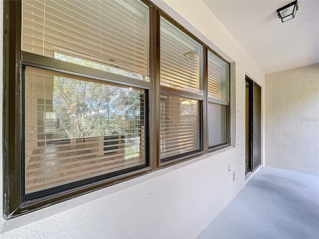 exterior details featuring a textured ceiling