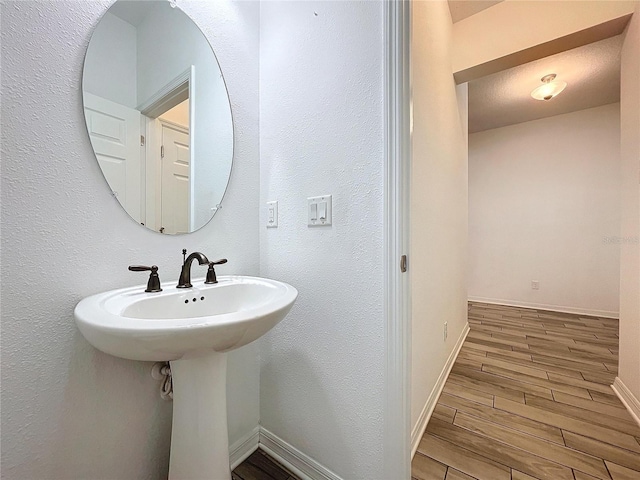 bathroom featuring hardwood / wood-style floors