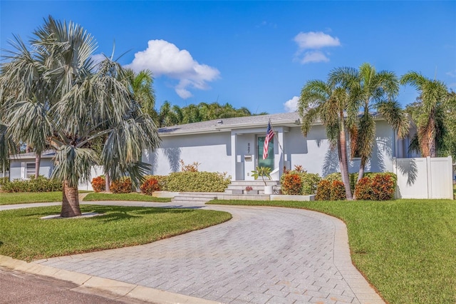 view of front of house with a front lawn