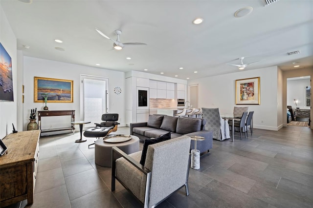 living room featuring ceiling fan