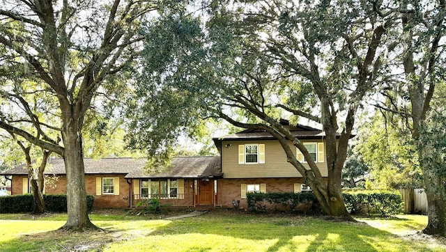 view of front facade with a front yard