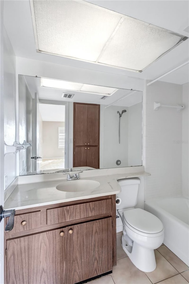 full bathroom featuring vanity, shower / washtub combination, toilet, and tile patterned flooring