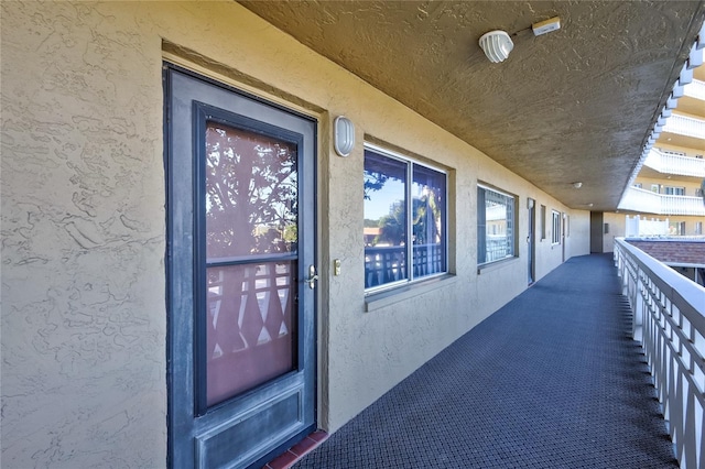 doorway to property featuring a balcony