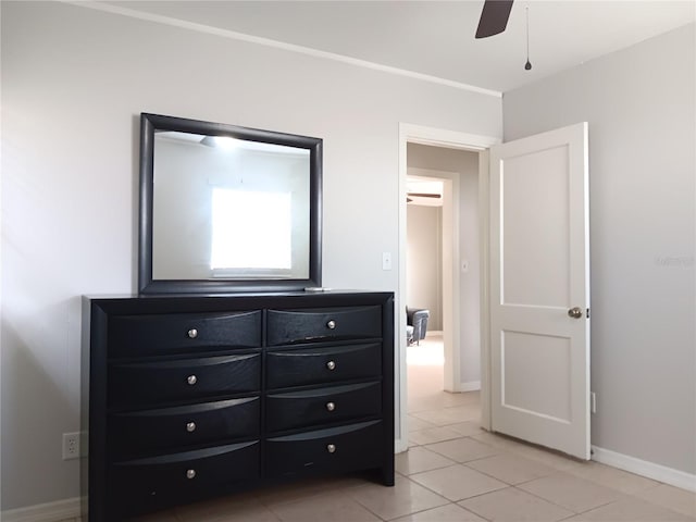 bedroom featuring ceiling fan and light tile patterned floors