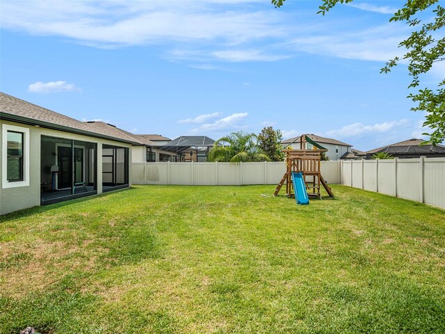 view of yard with a playground