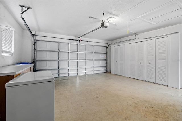 garage featuring a garage door opener and refrigerator