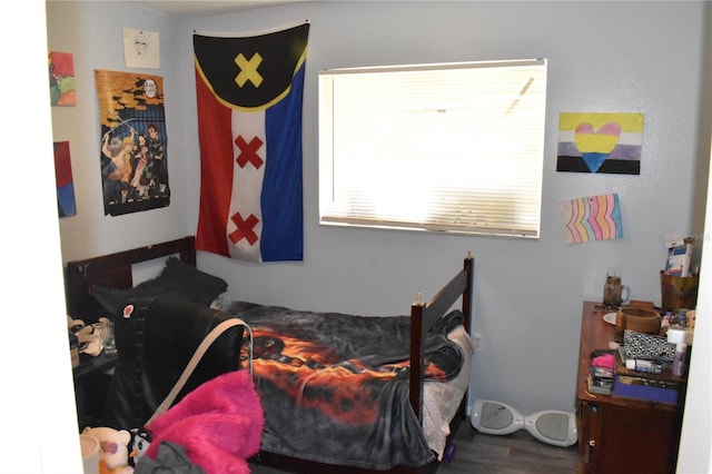 bedroom featuring hardwood / wood-style flooring