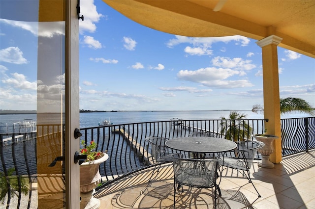 balcony featuring a water view