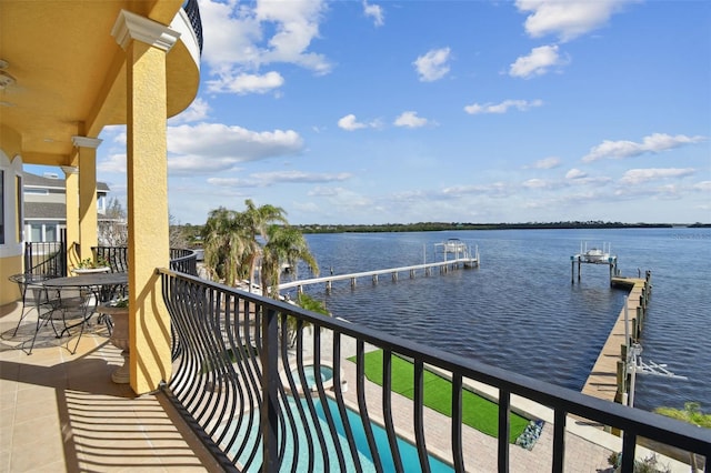 balcony featuring a water view