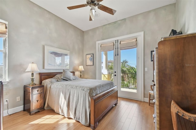 bedroom featuring ceiling fan, access to exterior, and light hardwood / wood-style flooring