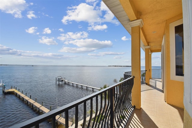 balcony featuring a water view