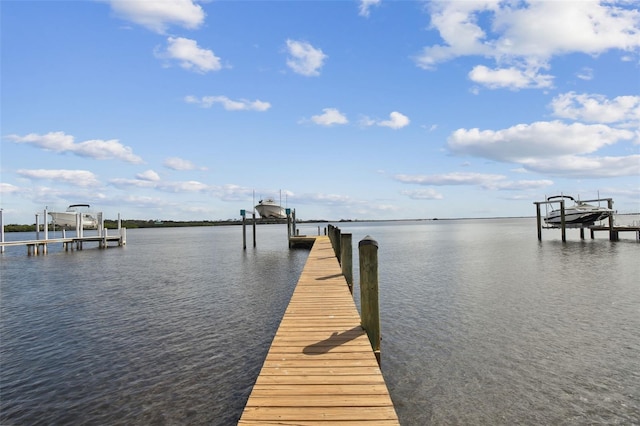 view of dock with a water view