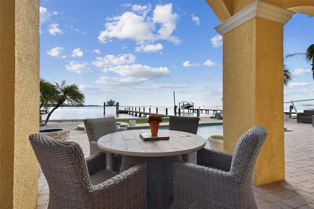 view of patio / terrace with a water view