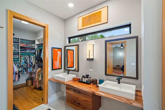 bathroom featuring hardwood / wood-style floors and vanity