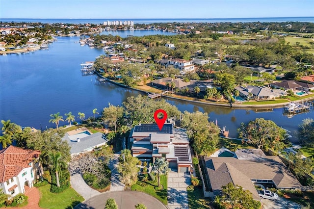 birds eye view of property featuring a water view