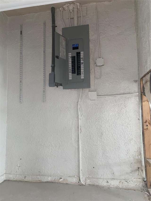 utility room featuring electric panel