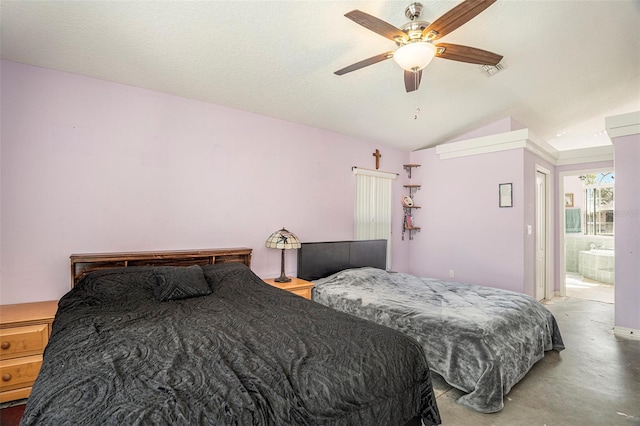 bedroom with concrete floors, a textured ceiling, ceiling fan, lofted ceiling, and connected bathroom