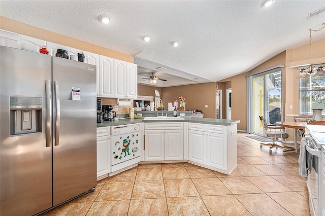 kitchen with stainless steel refrigerator with ice dispenser, sink, white cabinetry, white dishwasher, and kitchen peninsula