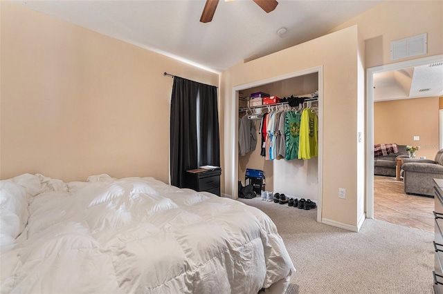 bedroom with carpet flooring, ceiling fan, and a closet