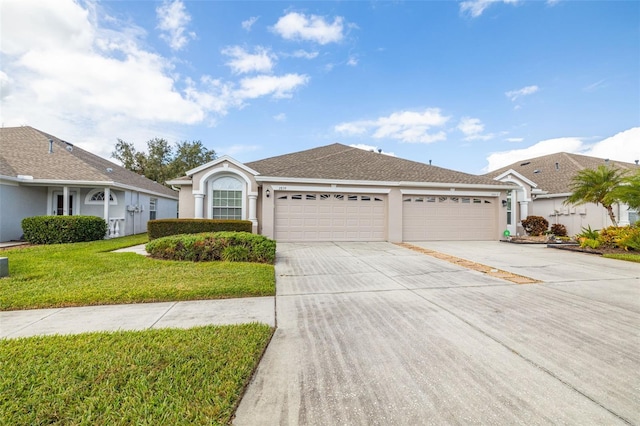 ranch-style house with a front lawn and a garage