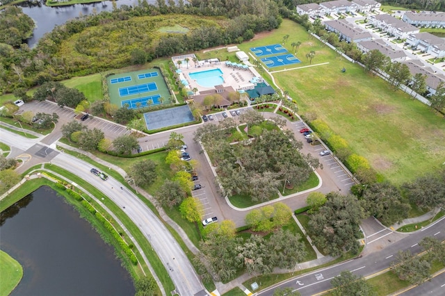 birds eye view of property featuring a water view