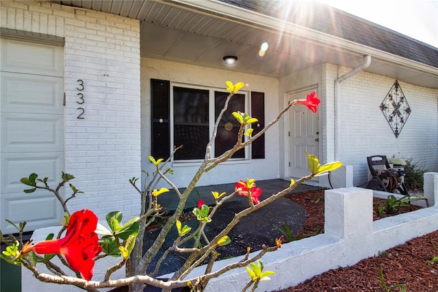 property entrance featuring a garage