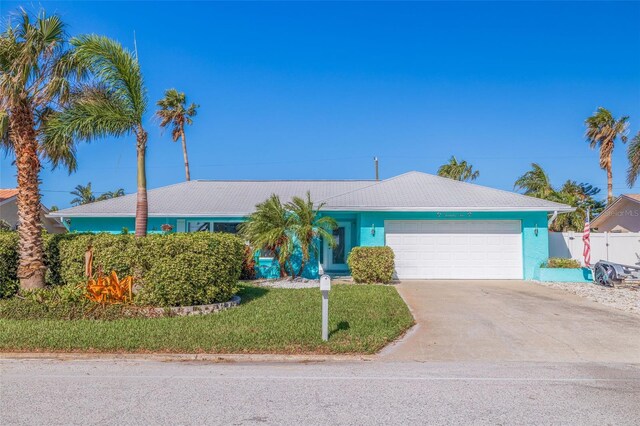 single story home featuring a garage