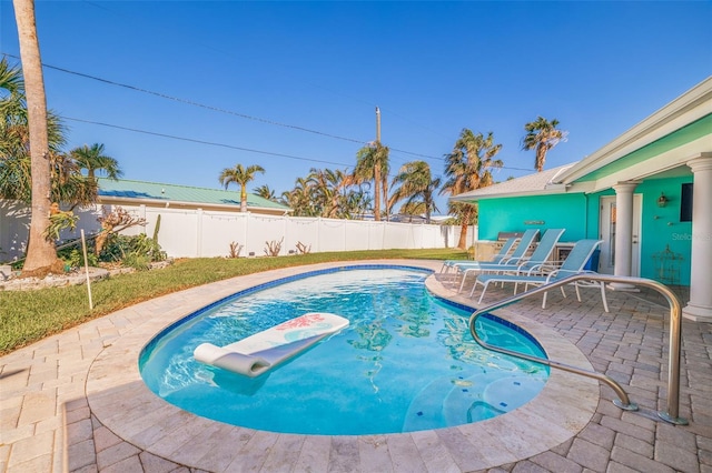 view of pool featuring a patio area