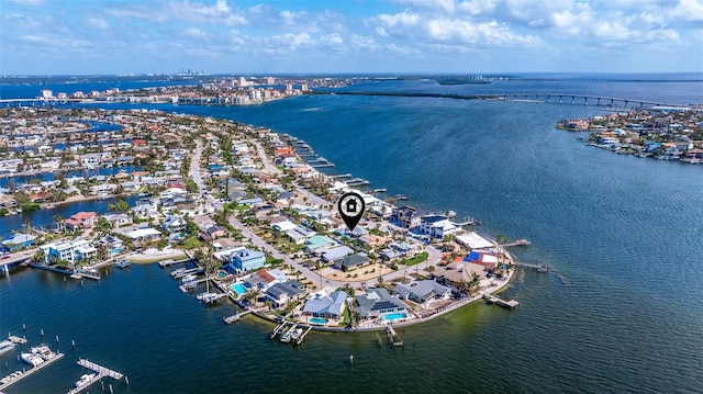 birds eye view of property featuring a water view