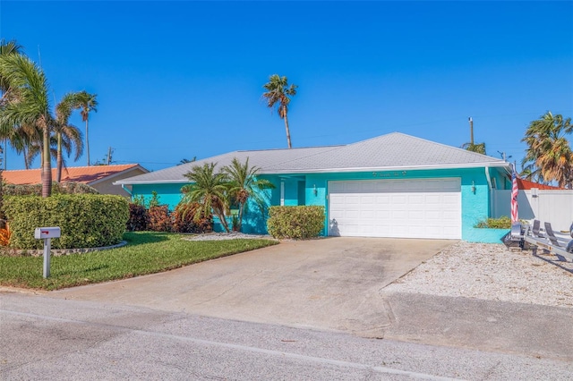 single story home with a garage