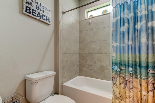 bathroom featuring toilet and shower / bathtub combination with curtain