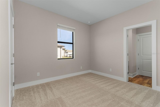 unfurnished bedroom with light carpet