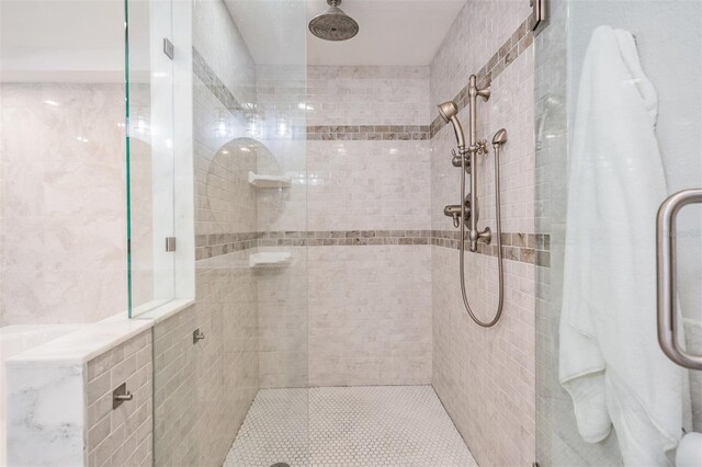 bathroom featuring an enclosed shower